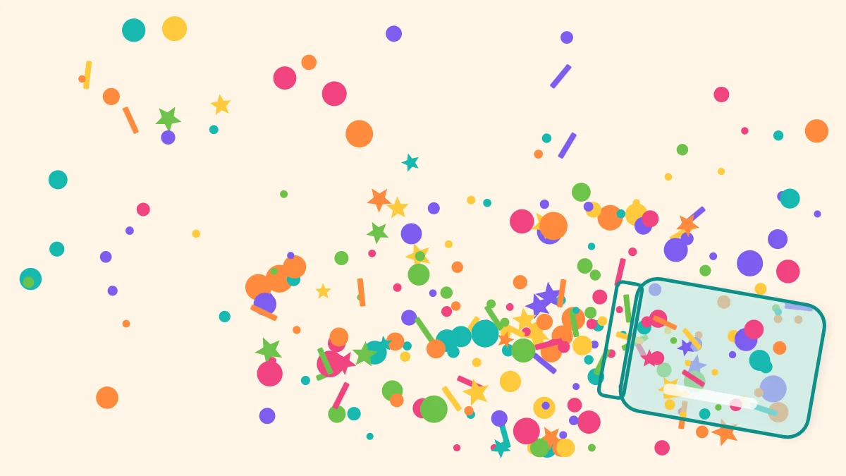 Colorful handmade paper confetti circles, stars and strips spilling from a small jar onto a table