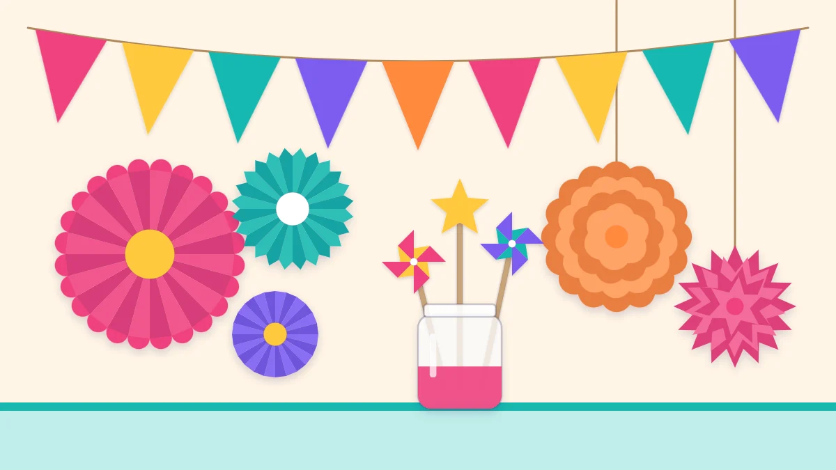 A party wall decorated with a pennant banner, three paper rosettes and two tissue pom-poms above a table