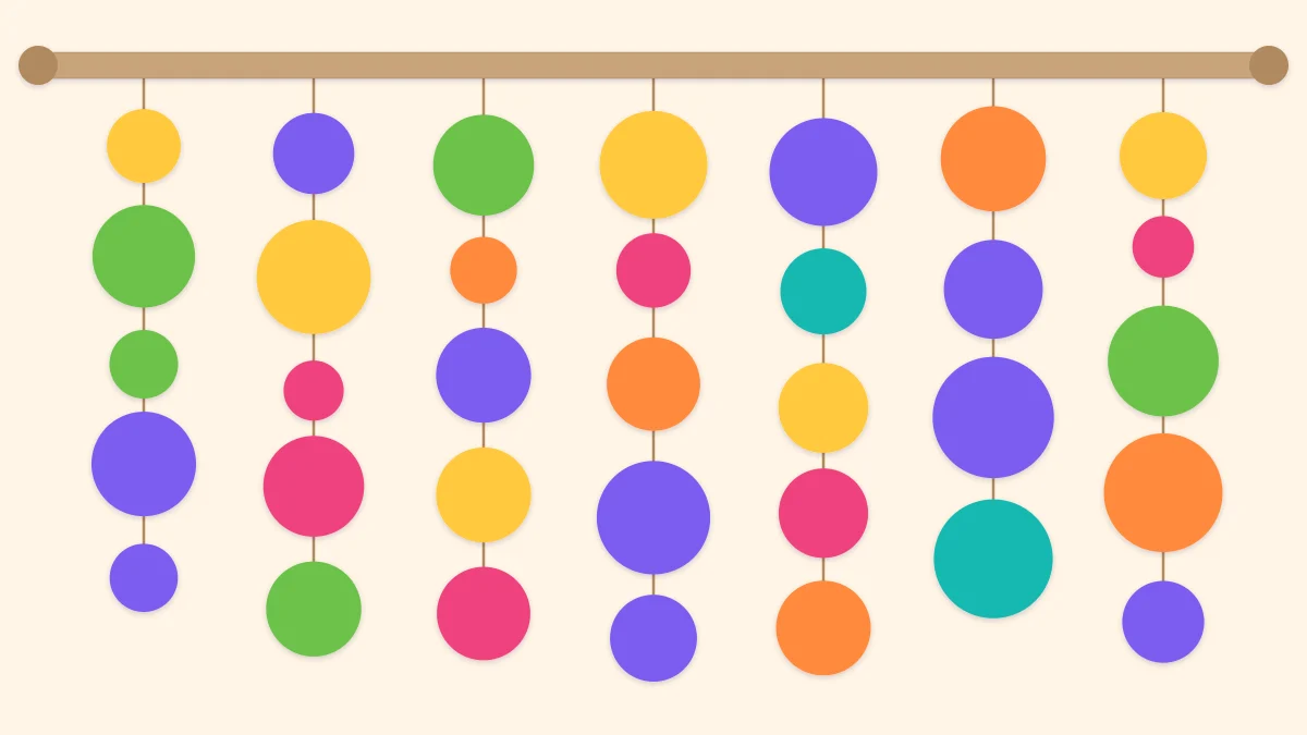 A curtain of vertical paper circle garlands in mixed sizes and bright colors hanging from a rod